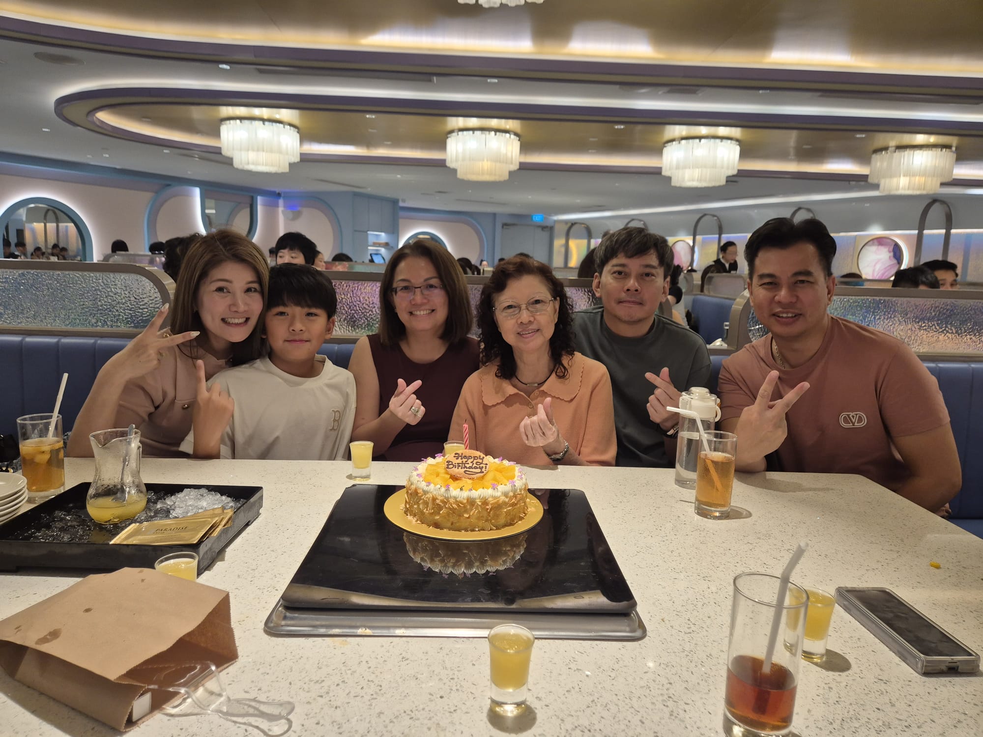 Gerald with his family at a birthday dinner