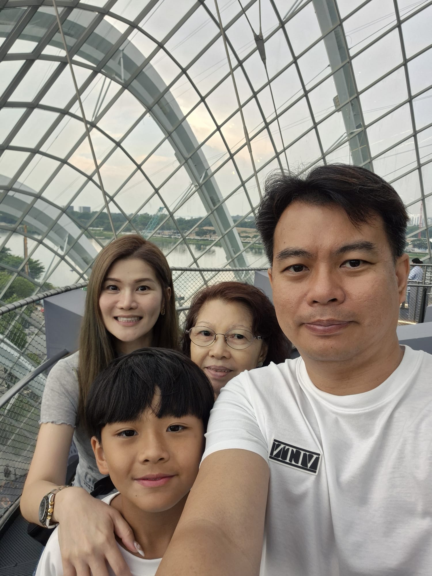 Gerald and his family taking a selfie together